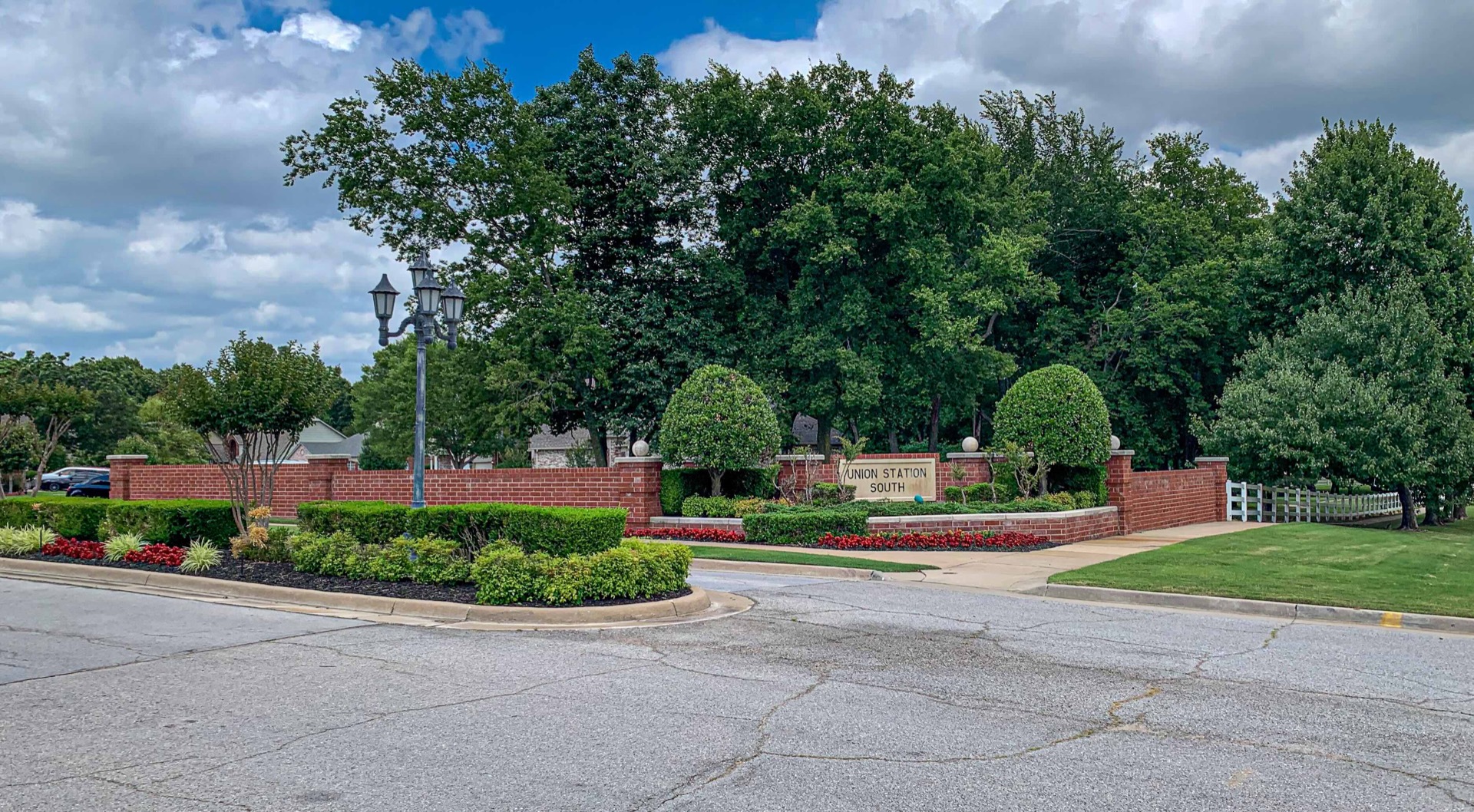 Green space with trees and fencing